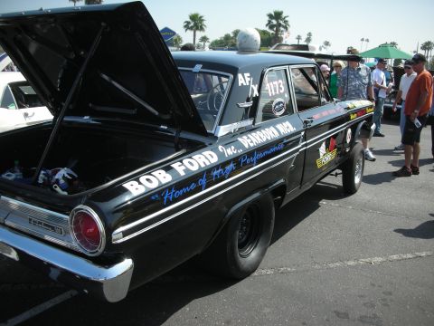 2004 Ford Crown Victoria - Bob Ford Inc. Dearborn Mich. drag car with trunk open at an outdoor car show.