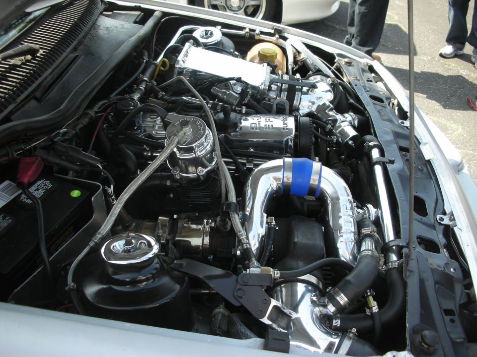 Engine bay with chrome turbocharger piping and polished components