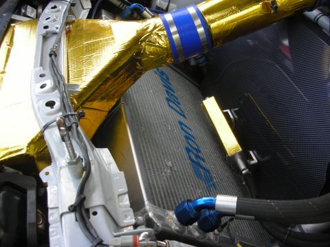2004 Ford Crown Victoria - Custom engine bay modifications are visible, including heat shielding and a "Ron Davis" branded component.