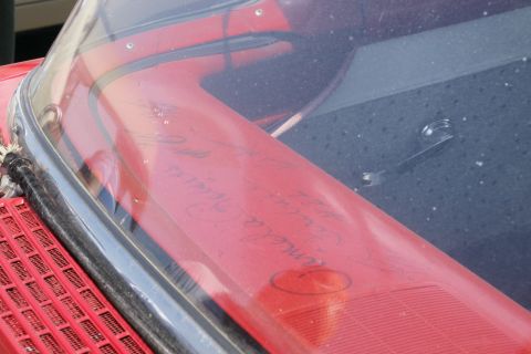 1992 Ford Taurus - Handwritten signatures cover the dashboard of this car's interior.