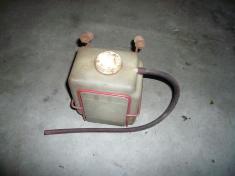 1975 Ford Ranchero - A used windshield washer fluid reservoir is shown, not a 1975 Ford Ranchero.