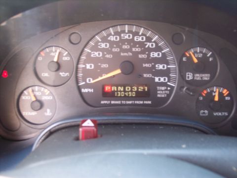 2006 Chevrolet Corvette - The dashboard gauges show an odometer reading of 130,490 miles and the transmission is in Park.