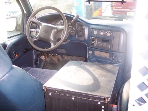 2006 Chevrolet Corvette - The interior of a vehicle, including the dashboard, steering wheel, and seats, is visible.
