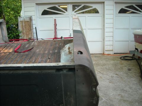 1979 Ford F-150 - Rear view of a 1979 Ford F-150 pickup truck bed, showing its weathered condition.