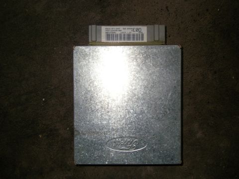 1990 Ford Bronco - Ford powertrain control module (PCM) showing the silver metal housing, Ford oval logo, and a barcode part-number label.