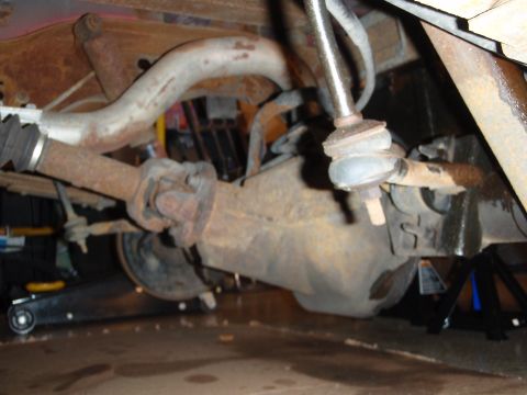 1995 Ford Bronco - Close-up view of the rear suspension and differential assembly.