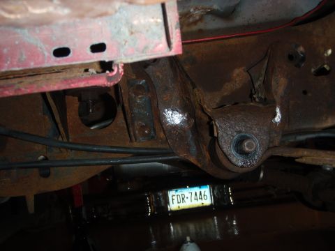 1995 Ford Bronco - Heavily rusted vehicle frame and suspension components are shown in detail.
