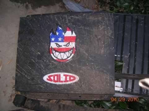 1985 Ford Bronco - Skid plate with American flag Spitfire logo and SOLID sticker, dated 04.29.2010.