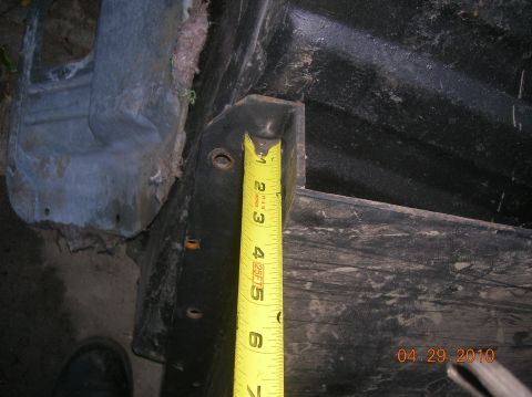 1985 Ford Bronco - A measuring tape is shown against a black textured surface, with a metal bracket visible on the left. The date 04.29.2010 is visible in the…