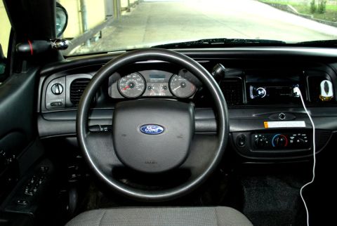 1998 Ford Crown Victoria - The interior of a 1998 Ford Crown Victoria, the driver's side controls and dashboard.