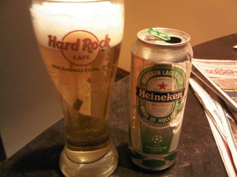 1996 Ford Bronco - A Heineken beer can with a paperclip on top sits next to a Hard Rock Cafe glass filled with beer.