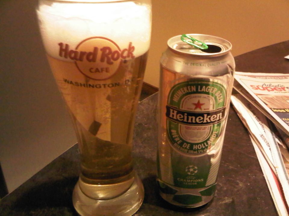 Heineken can with paperclip and Hard Rock Cafe glass
