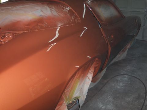 1980 Chevrolet Camaro - A car body, masked and covered in primer, is being prepared for a new paint job.