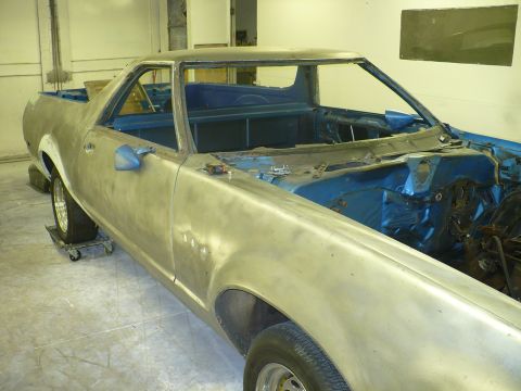 1978 Ford Ranchero - This 1978 Ford Ranchero is undergoing restoration, showing its bare metal body and blue interior.