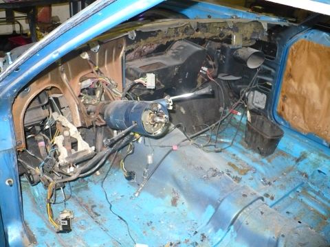 1978 Ford Ranchero - Interior view of a 1978 Ford Ranchero with the dashboard removed and wiring exposed.