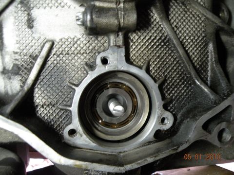 2000 Porsche Carrera - A close-up view of a mechanical component, likely from an engine, showing a bearing assembly.