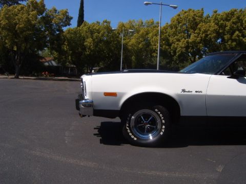 1973 Ford Ranchero - Front quarter view of a white 1973 Ford Ranchero 500 with a black vinyl top.