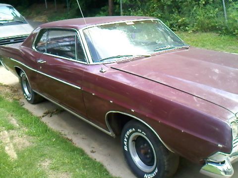 1993 Mercury Grand Marquis - Maroon 1969 Ford Galaxie 500 coupe with chrome trim and whitewall tires.