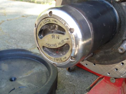 1984 Ford Bronco - Warn locking hub shown in detail, indicating 'LOCK' and 'FREE' positions.
