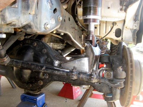 1996 Ford Bronco - Modified front suspension components are visible, including a large differential and shock absorber assembly.