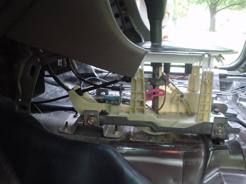 1999 Ford Taurus - Picture of the underside of the floor shifter from the drivers side looking twards the passangers side.