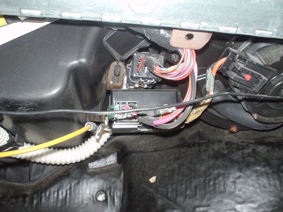 This is a picture of the blower motor resistor pack and the blower motor. The sht is taken from the passenger foot well, looking up and twards the front of the car.