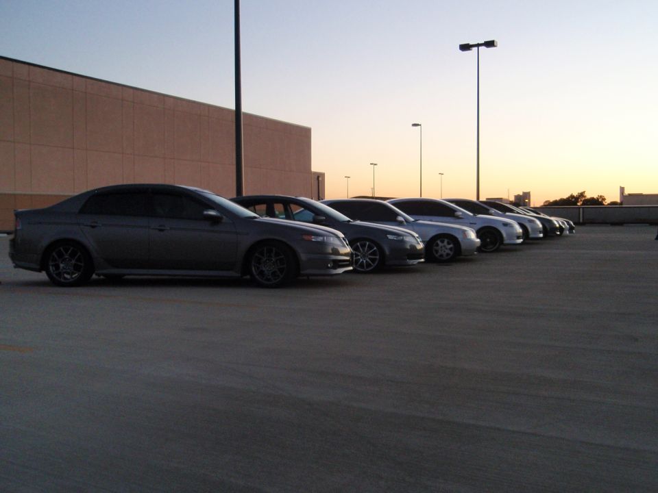 Gray 2004 Acura TL sedan parked in a lot, side view