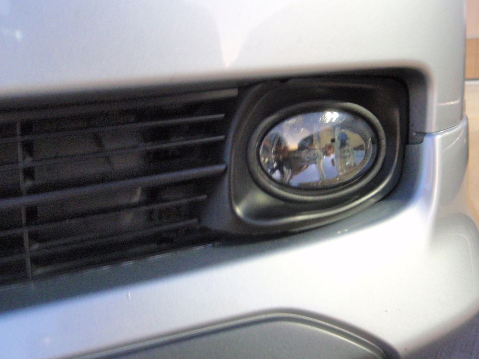 Silver 2003 Acura TL front bumper fog light