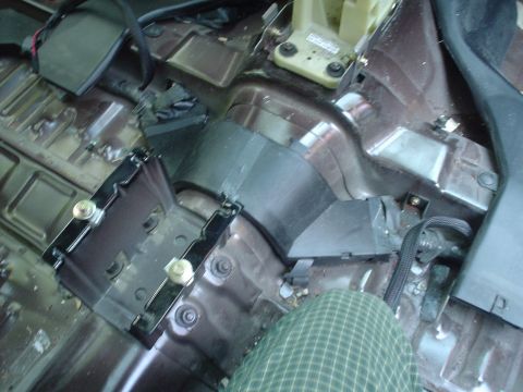 1999 Ford Taurus - This is a picture of the center console mounting bracket from the rear passenger footwell.