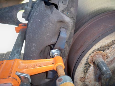 1994 Ford Bronco - Make sure that your clamp depresses the caliper all the way so you can get the brake assembly off later.
