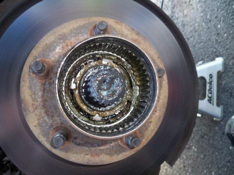 1994 Ford Bronco - Right about now is when you'll need that handy (and expensive) 4-pronged bearing removal socket.