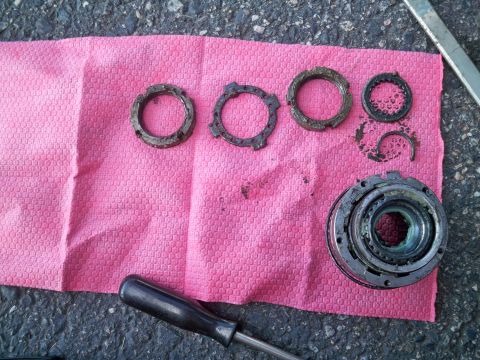 1994 Ford Bronco - Hub assembly with all of the various rings and keepers that sit behind it on the spindle. All of which got a nice bath in the parts cleaner.