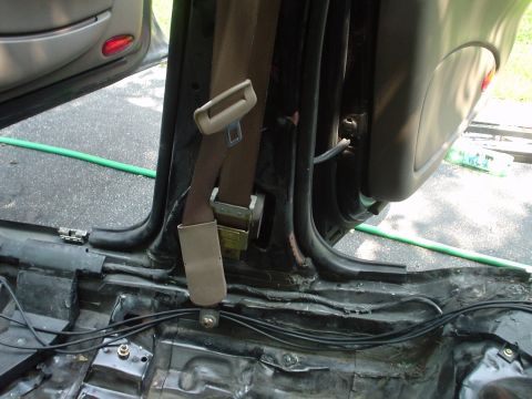 1999 Ford Taurus - This is a simmilar pciture of the passenger side seat belt and lower b pilliar.