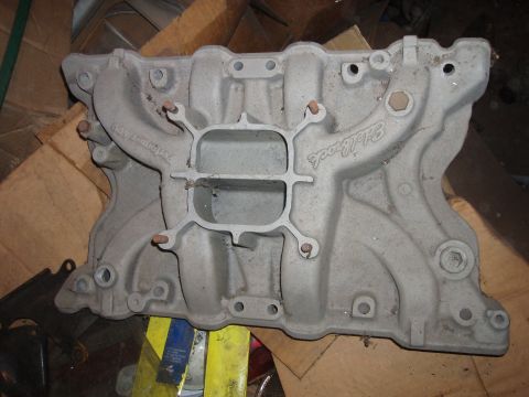 1979 Ford Bronco - An Edelbrock Performer RPM intake manifold is shown, with text indicating its model and manufacturer.