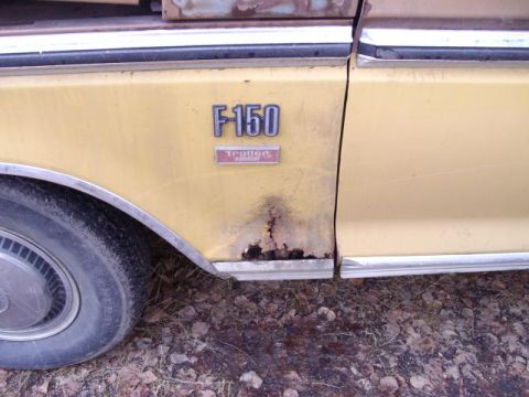 1976 Ford F-150 - Close-up of a 1976 Ford F-150 fender, highlighting rust and the 'Trailer Special' badge.
