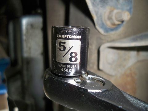 1994 Ford Bronco - Close-up of a Craftsman 5/8 socket on a ratchet, likely for automotive repair.