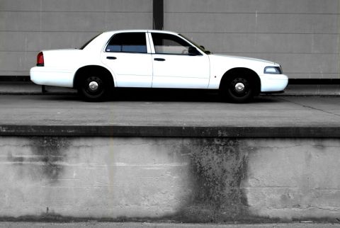 1998 Ford Crown Victoria - Side profile of a white 1998 Ford Crown Victoria sedan.