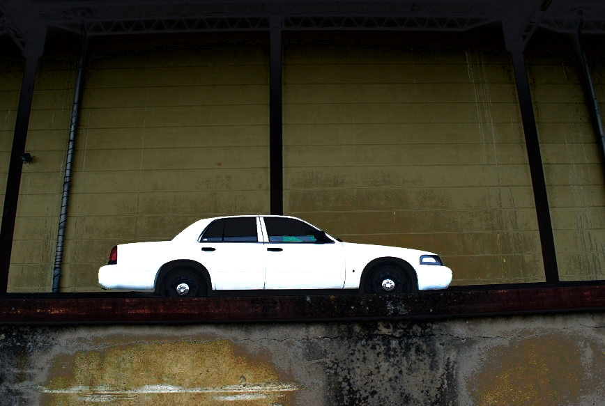 White 1998 Ford Crown Victoria sedan, side view