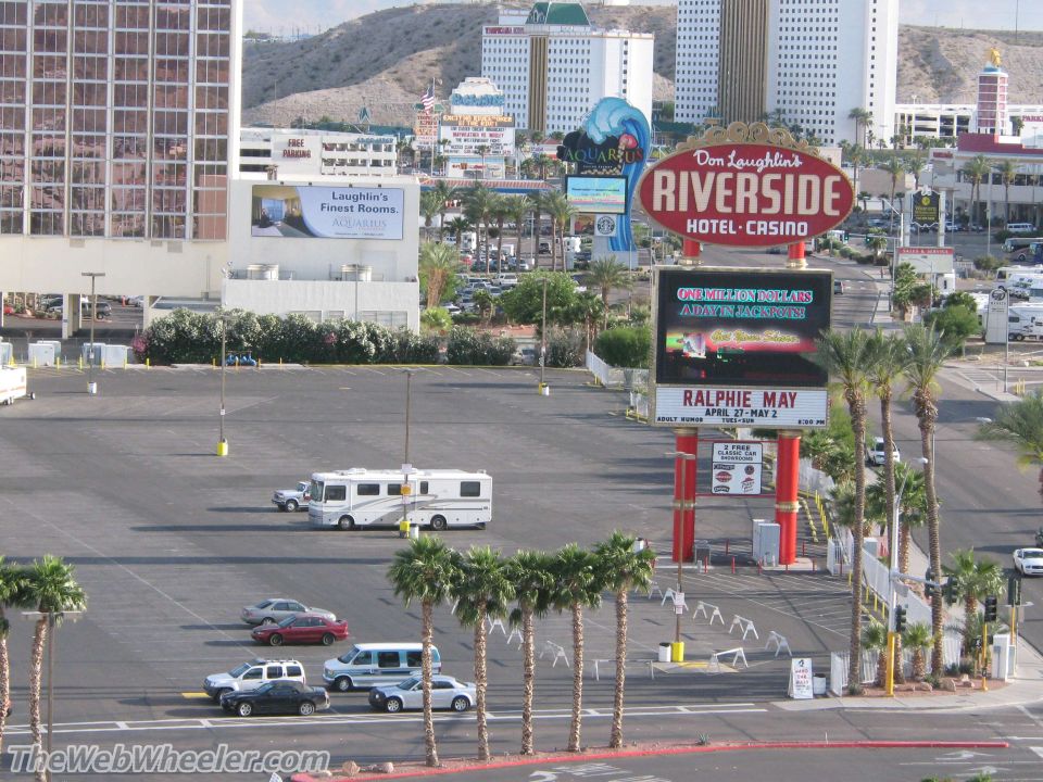 White RV parked in a casino parking lot