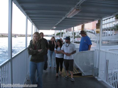 1996 Ford C-350 (Centurion Conversions) - People disembarking from a ferry or boat onto a covered walkway.