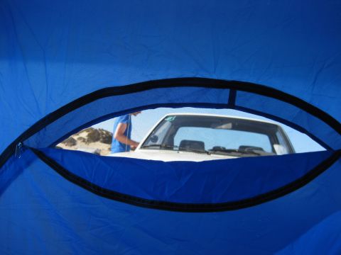 1989 Toyota Pickup/SR5 - View of a 1989 Toyota Pickup/SR5 from inside a blue tent.