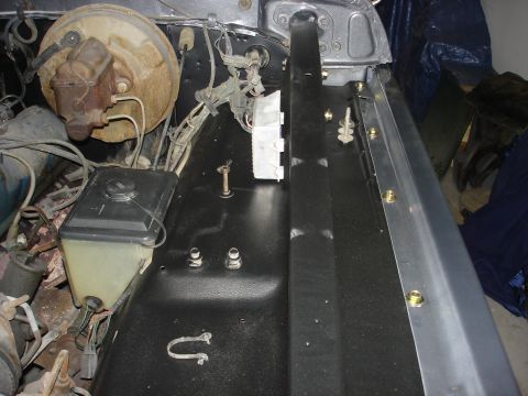 1979 Ford F-250 - Engine bay components including brake booster, master cylinder, and power steering reservoir are visible.