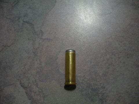 1996 Ford Bronco - A close-up view of a single bullet cartridge, not a vehicle.