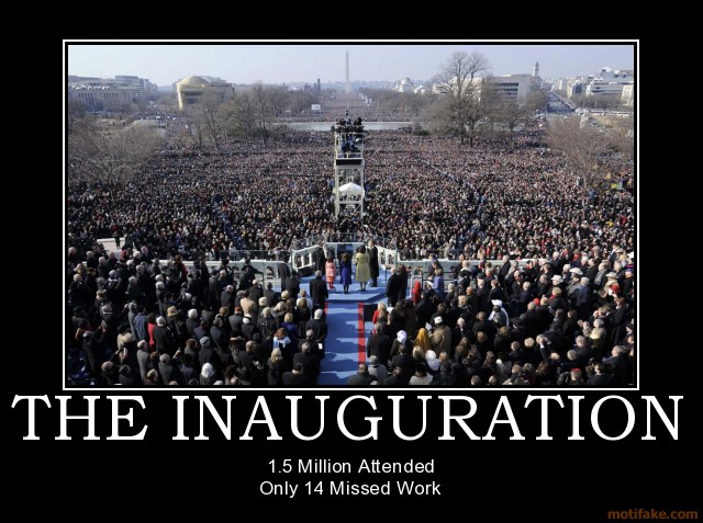 Large crowd gathered for an inauguration ceremony with a stage and speakers