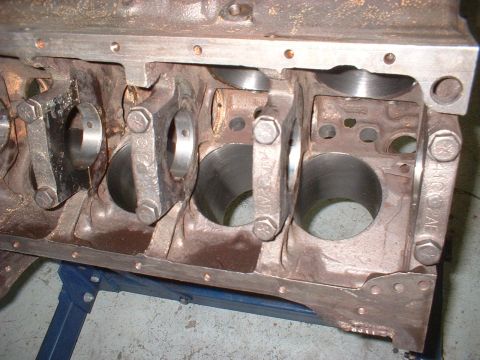 1969 Ford Torino - Close-up view of an engine block showing connecting rods and cylinder bores, likely from a vintage vehicle.