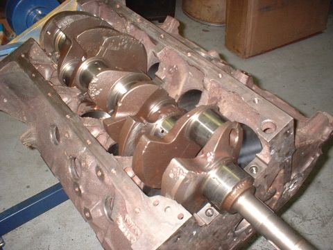 1969 Ford Torino - Close-up view of a disassembled engine block, highlighting the crankshaft and its bearings.