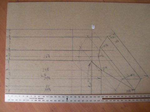 1987 Suzuki Samurai - A technical drawing with various measurements and geometric shapes is laid out on a piece of cardboard.