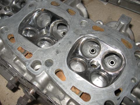 1991 Mitsubishi 3000GT - Close-up view of an engine cylinder head, revealing its internal structure and ports.