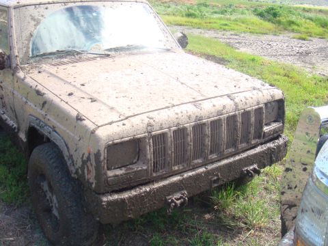 1992 Ford Bronco - This Jeep Cherokee XJ is covered in mud after an off-road excursion.