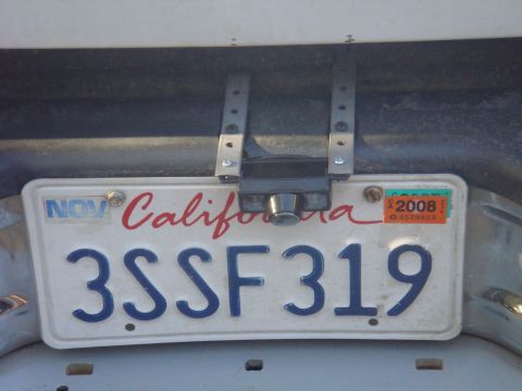 1992 Ford Bronco - California license plate 3SSF319 and an aftermarket backup camera are visible.